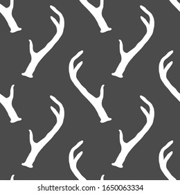Seamless pattern with deer antlers. Vector hunting background. Nature wildlife animal backdrop.