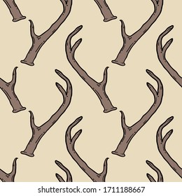 Seamless pattern with deer antlers. Vector background illustration. Nature wildlife animal beige and brown backdrop.