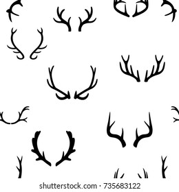 Seamless pattern with deer antlers. Vector illustration EPS 10. White background.