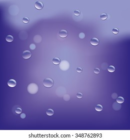 Seamless pattern. Defocused blue glass background. Raindrops.