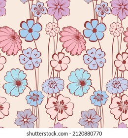 Seamless pattern of delicate blue,pink and lilac daisies and bluebells
