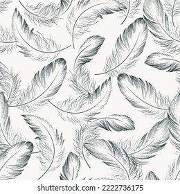 Seamless pattern of delicate feathers drawn in black ink. Texture brush and paint. Vector illustration