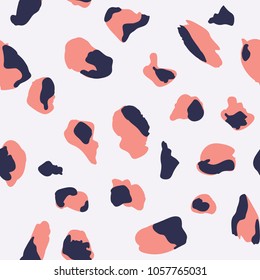 Seamless pattern design with abstract animal print style shapes, creative repeat background