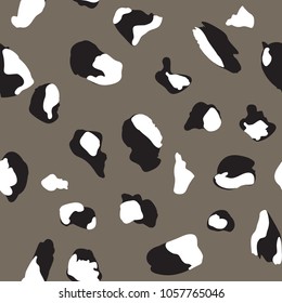Seamless pattern design with abstract animal print style shapes, creative repeat background