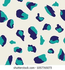 Seamless pattern design with abstract animal print style shapes, creative repeat background