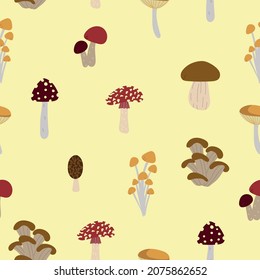 Seamless pattern design. Autumn backdrop for wallpaper, print, textile, fabric, wrapping. Mushrooms isolated on yellow background