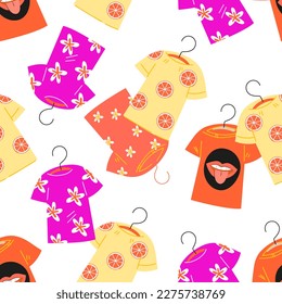 Seamless pattern design with bright summer t-shirts, flat vector illustration on white background. Clothing seamless pattern.