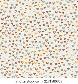 Seamless pattern design with colorful hearts in boho style. Vector romantic background. Great for fabric, textile, apparel.