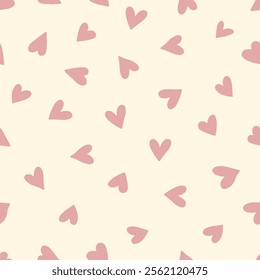 Seamless pattern design with colorful hearts in boho style. Simple abstract texture. Romantic background. Great for fabric, textiles, and apparel. Soft pink and beige colors. Vector illustration