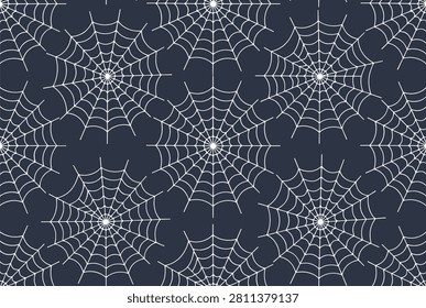 Seamless pattern design displays white spider webs repeating across a dark blue background suitable for halloween and spooky themes.