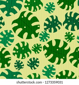 Seamless pattern for design fabric, wallpaper, paper. Simple cute leaves of tropical plants. Vector illustration.