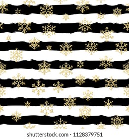 Seamless pattern design. Gold glittering snowflakes on black and white striped background. EPS 10