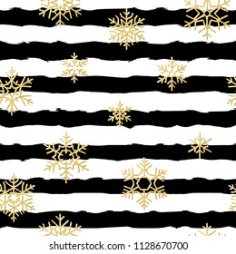 Seamless pattern design. Gold glittering snowflakes on black and white striped background. EPS 10