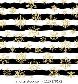 Seamless pattern design. Gold glittering snowflakes on black and white striped background. EPS 10