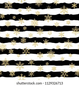 Seamless pattern design. Gold glittering snowflakes on black and white striped background. EPS 10