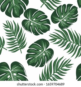 Seamless pattern design of green tropical leaves isolated on white background