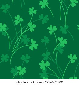 Seamless pattern design template. Green  clover leaves  on green background.
Vector stock illustration.