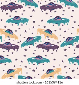 seamless pattern design with yellow, green and purple galactic planets, perfect to use on the web or in print