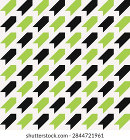 Seamless pattern of diagonal lines of black and bright neon green arrows on a pale grey background 