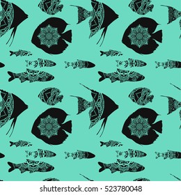 Seamless pattern with different black fishes on blue background with mandalas, vector illustration