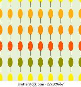 Seamless pattern with different colored autumn trees on light yellow background. For holiday decoration, textile, wrapping paper, wallpaper, gift boxes, other packing elements