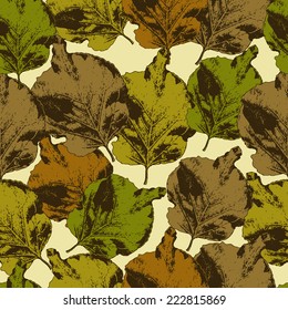Seamless pattern with different colored leaves