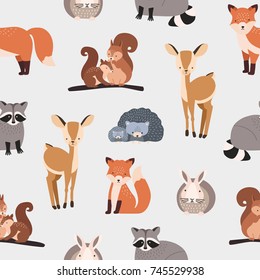 Seamless pattern with different cute cartoon forest animals on white background - squirrel, hedgehog, fox, deer, rabbit, raccoon. Flat vector illustration for textile print, wallpaper, wrapping paper.