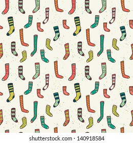 Seamless pattern with different doodle hand drawn socks. Vector background.