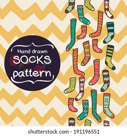 Seamless pattern with different doodle hand drawn socks on chevron background. Bright doodle geometrical tiling pattern.