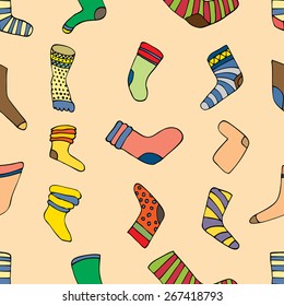 Seamless pattern with different doodle hand drawn socks on chevron background. Bright doodle geometrical tiling pattern.