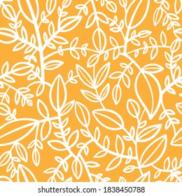 Seamless pattern with different leaves on orange background. Vector print with plants.