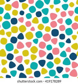 Seamless pattern with different shapes of fresh colors on a white background. Vector repeating texture.