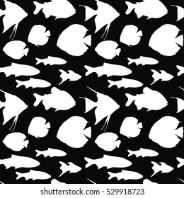 Seamless pattern with different white fishes on black background, vector illustration.
