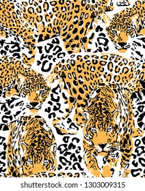 Seamless pattern with a different wild leopards and spots of skin. Textile composition, hand drawn style print. Vector illustration.