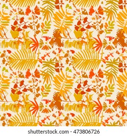 Seamless pattern with different yellow leafs on white background