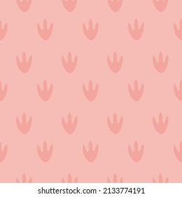 Seamless pattern with dinosaur footprint on coral background. Digital pastel background for kids fabric, textile and scrapbook paper.