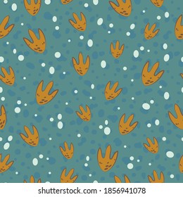 Seamless pattern dinosaur footprints for kids textile or fabric. Vector illustration.