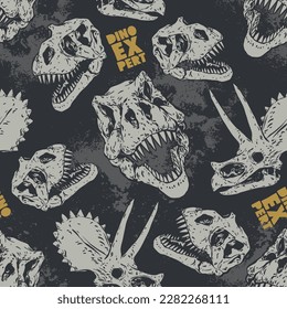 Seamless pattern of a dinosaur skull and typography background elements.