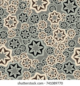 Seamless pattern. Disorderly arranged seven-sided colored figures.