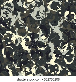 Seamless pattern. Disorderly blots. Spray paints. Grungy textiles. Coloring for children's clothing. Camouflage. Cartoon. Flat.