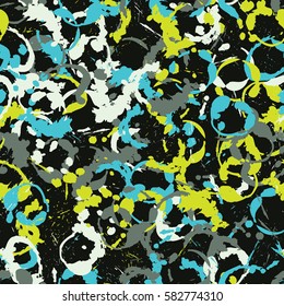 Seamless pattern. Disorderly blots. Spray paints. Grungy textiles. Coloring for children's clothing. Camouflage. Cartoon. Flat.