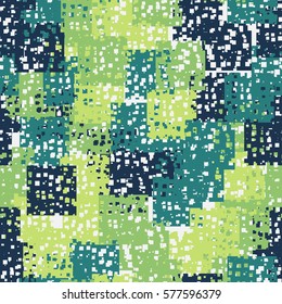 Seamless pattern. Disorderly patches. Perforated squares.  Chaos of colors. Fashion camouflage.