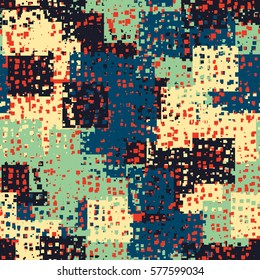Seamless pattern. Disorderly patches. Perforated squares.  Chaos of colors. Fashion camouflage.