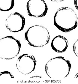 Seamless pattern with distressed dry brush circles and spots