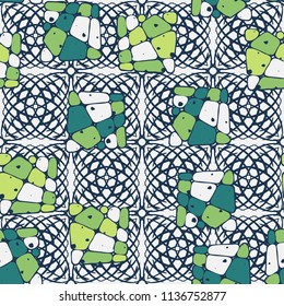 A seamless pattern from the divided into smoothed multi-colored fragments of quadrangles. The picture lies on the background of an openwork network consisting of square shapes.