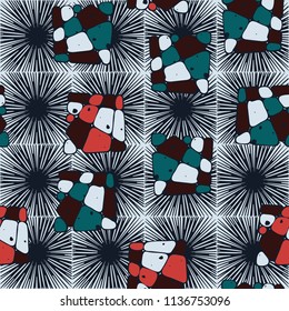 A seamless pattern from the divided into smoothed multi-colored fragments of quadrangles. The picture lies on the background of a texture consisting of square small suns.