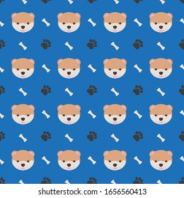 seamless pattern with dog face, footprint and bone on a blue background
