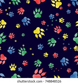 Seamless pattern of dog paw marks. Colorful traces of paws, made in watercolor, on a black background. Vektor
