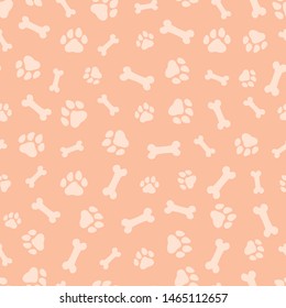Seamless pattern with dog paws and bones