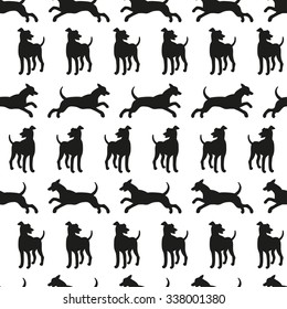 Seamless pattern with dog silhouettes. Vector background for your design.